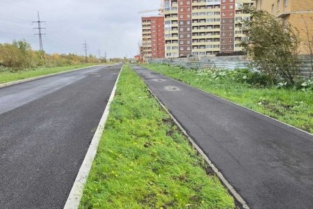 На улице Карпогорская в Архангельске заканчивается асфальтирование тротуаров