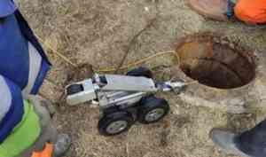 Известную на всю Россию архангельскую дорожную яму ремонтируют с помощью робота